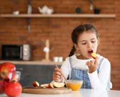 Little,Girl,Celebrating,Rosh,Hashanah,(jewish,New,Year),At,Home