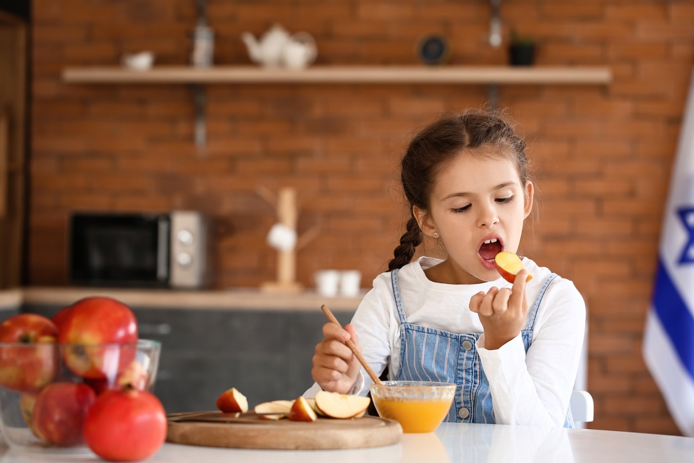 Little,Girl,Celebrating,Rosh,Hashanah,(jewish,New,Year),At,Home